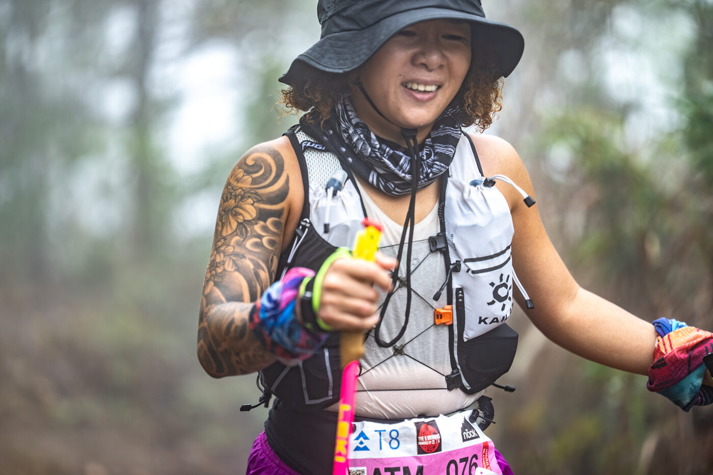 A smiling finisher on the trail